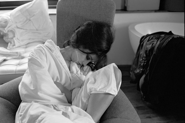 Mulberry model sleeps between shows, New York Fashion Week, February 2010 To celebrate  their 40th Anniversary, Mulberry commissioned Venetia to shoot a 'slice of life', documenting the quintessentially British brand from the New York Fashion Weeks, to their production factory in Somerset, partner forums and London parties. The work has recently been published into a 500 page coffee table book released in May 2011. 