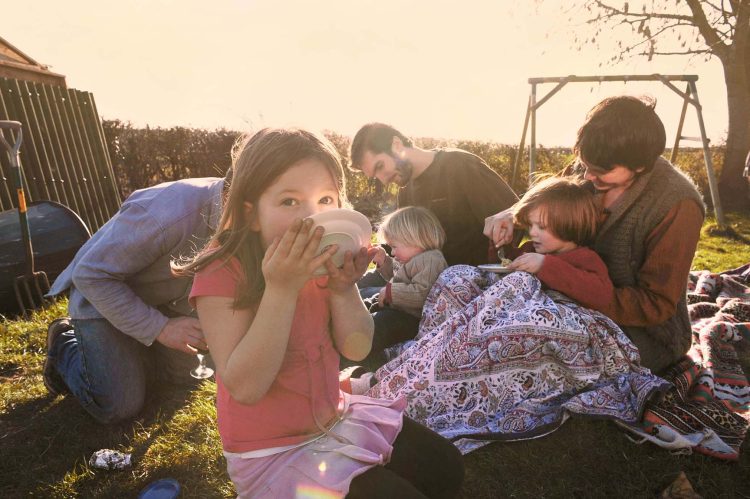 Family picnic in the garden. Somerset, UK Family picnic in the garden. Somerset, UK